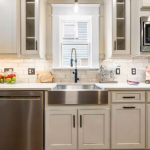 A newly remodeled kitchen sink and countertop.